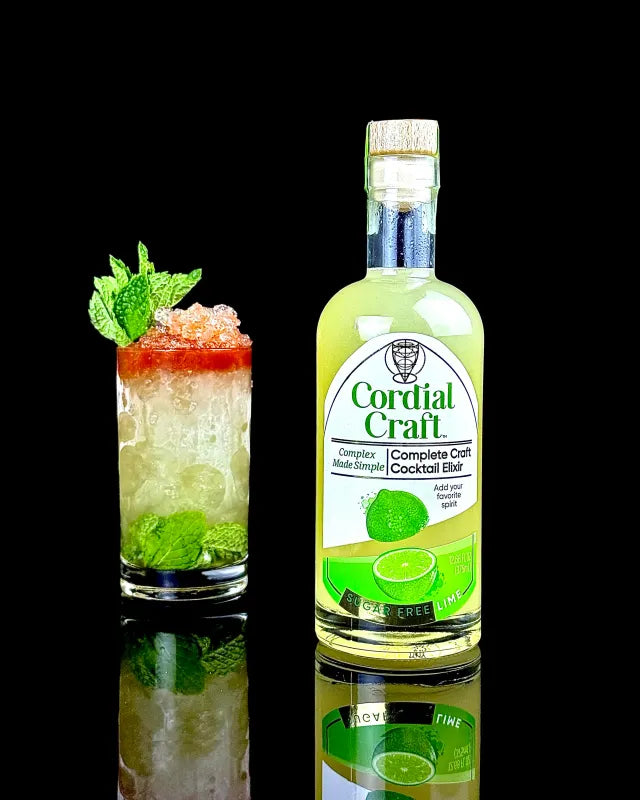 Queen's Park Remix cocktail beside a bottle of Cordial Craft
